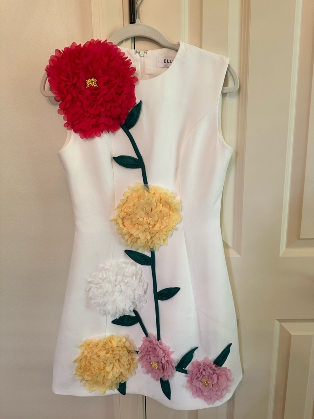 Elliatt White Kids Dress with Red, Yellow, Pink & White Floral Appliqués